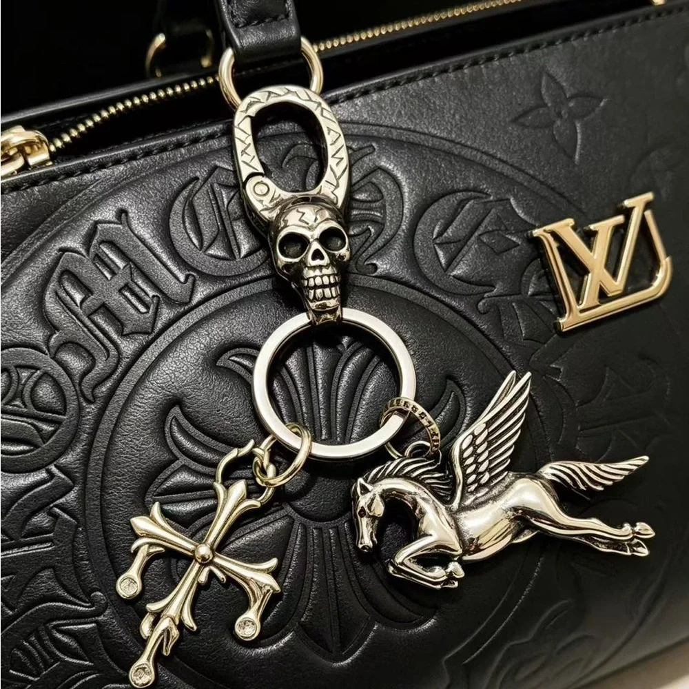 Chrome Hearts Silver Skull Clip Keychain with Pegasus and Cross Charms